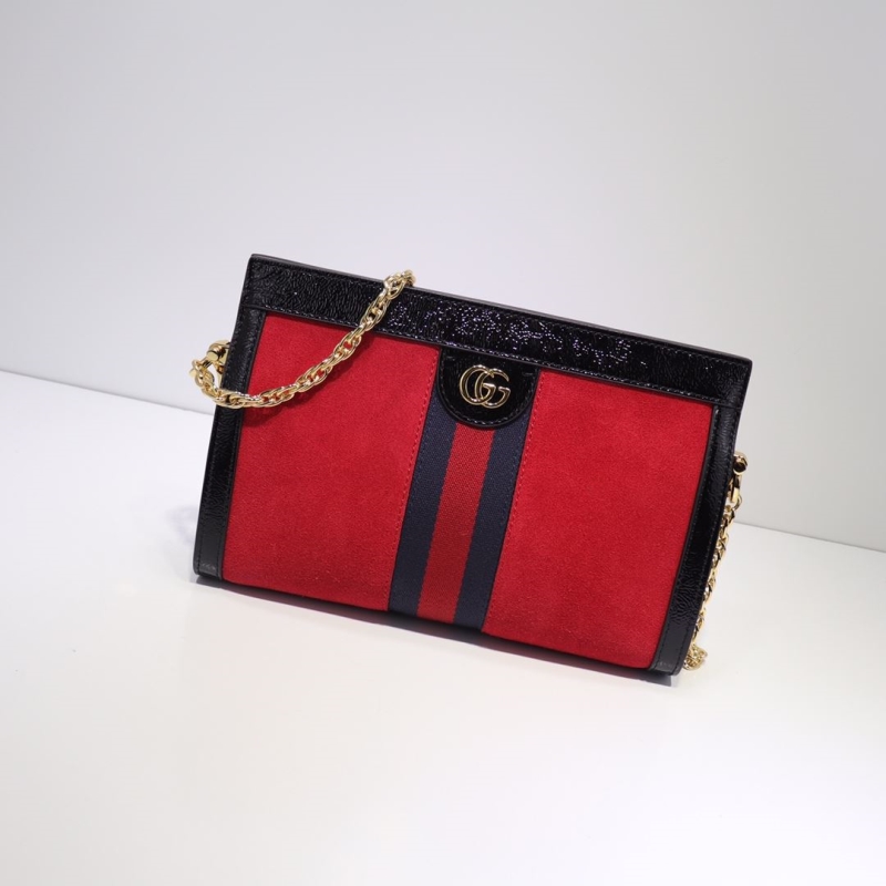 G*u*i clutch bags